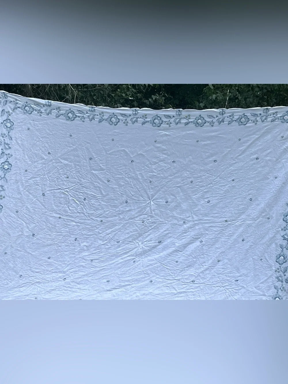 Embroidered White Linen tablecloth with blue flowers Motif